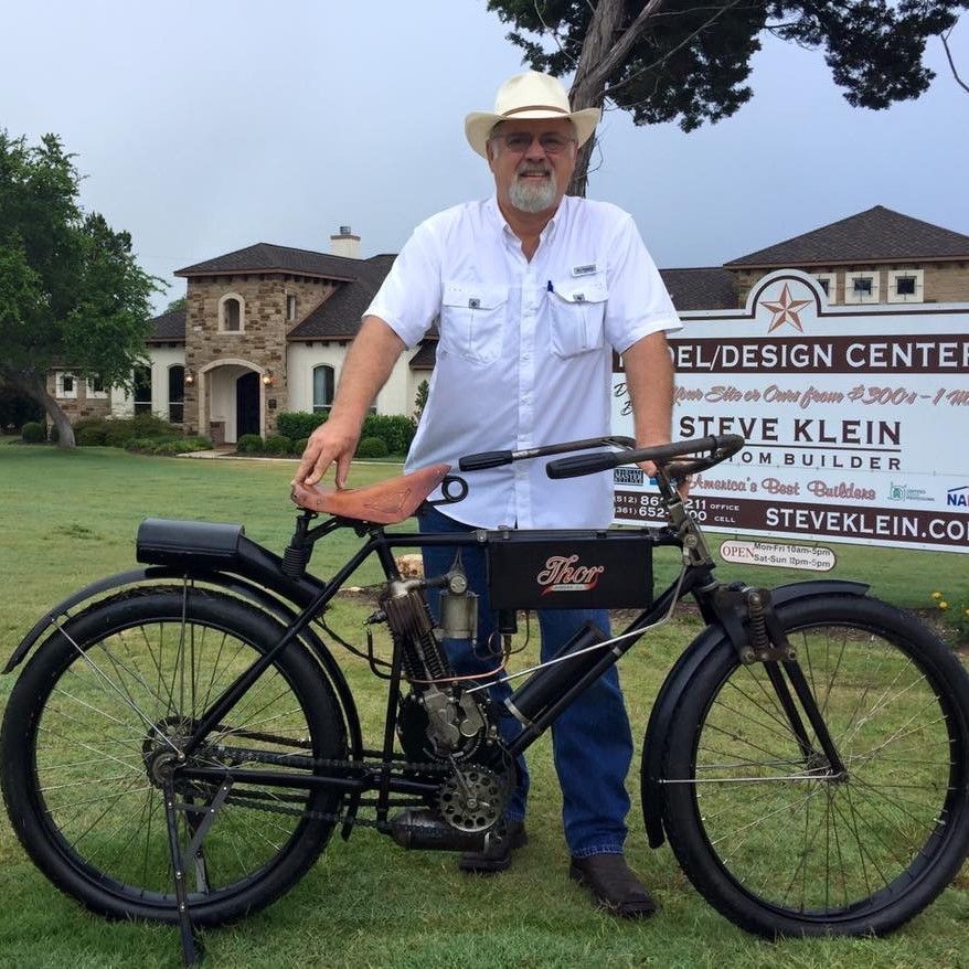 Steve Klein standing in front of his vintage bicycle