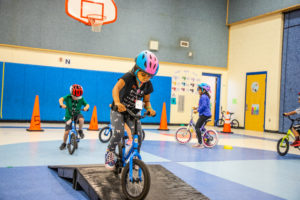 Learning to cycle at Lady Octavia. Progression to pedalling their